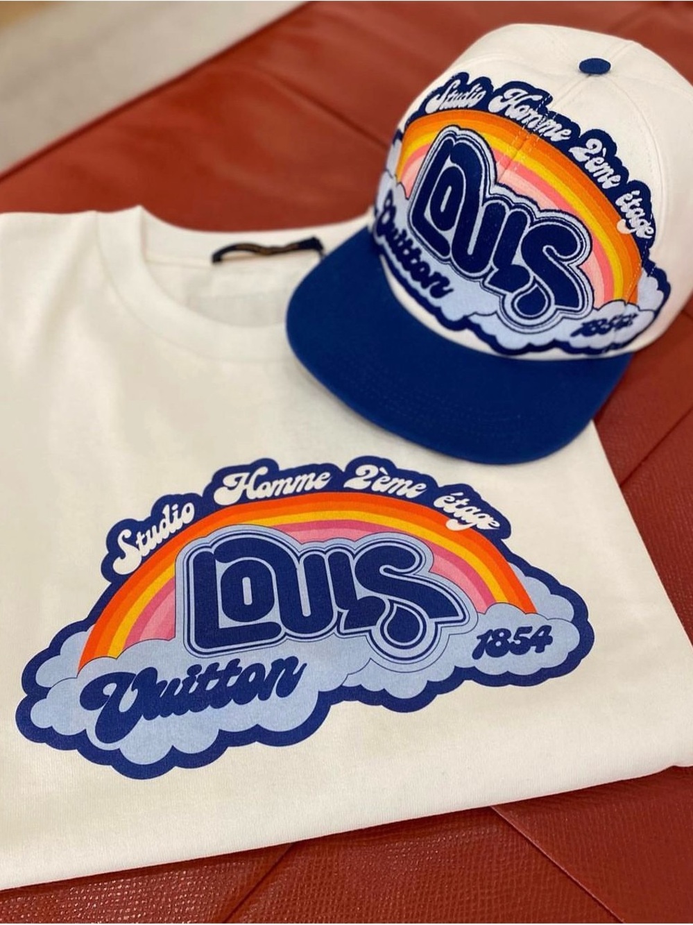 Louis Vuitton White mens Tee with Blue Logo and Rainbow Graphic